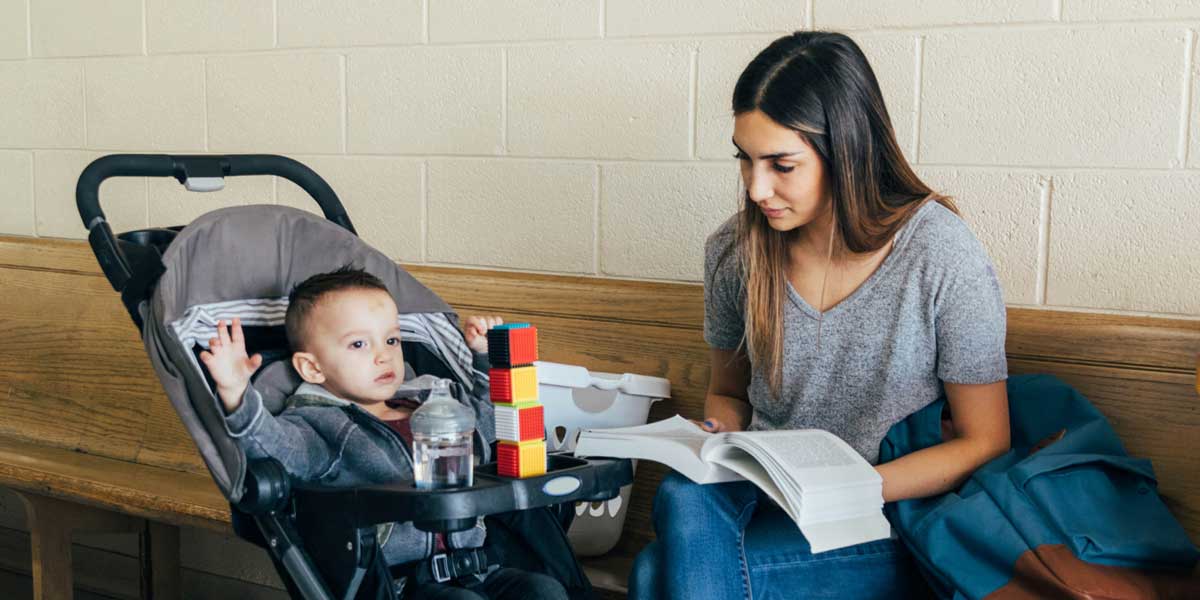 student with a baby